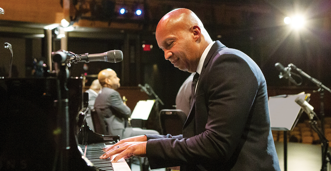 Bryan Stevenson playing piano