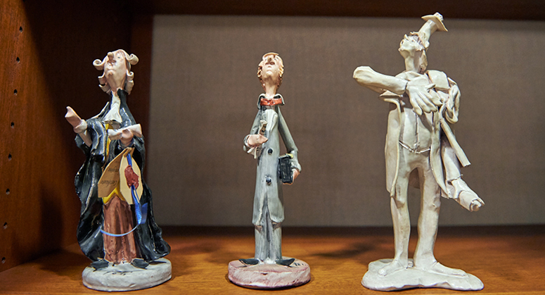 three figurative sculptures