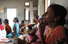 Group of women sitting and listening