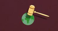 gavel on top of world map