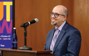 Gabriel Arkles at lectern