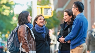 Students on sidewalk outside of Vanderbilt Hall 