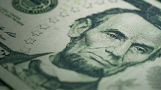 lincoln on a five dollar bill