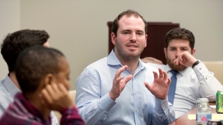 Group of students in discussion. 
