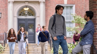 Student at Vanderbilt Hall arches