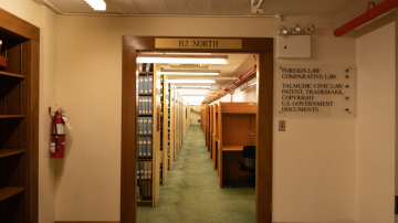 Doorway with bookshelves and study carrels on the other side