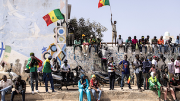 People protest with flags in Senegal