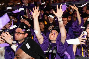 Cheering graduates at NYU Law Convocation 2026