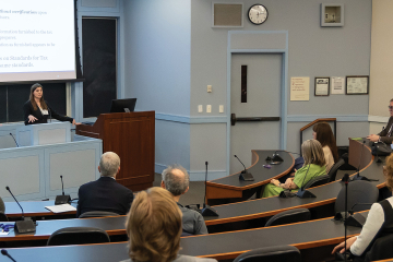 Megan Brackney lecturing in a classroom