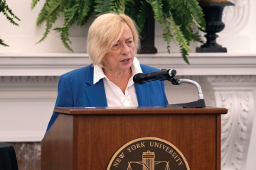 Janet Mills at lectern