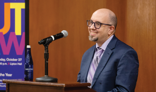 Gabriel Arkles at lectern