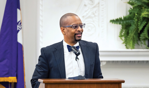 Dean Troy McKenzie at a podium
