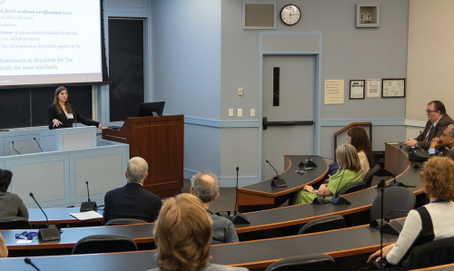 Megan Brackney lecturing in a classroom