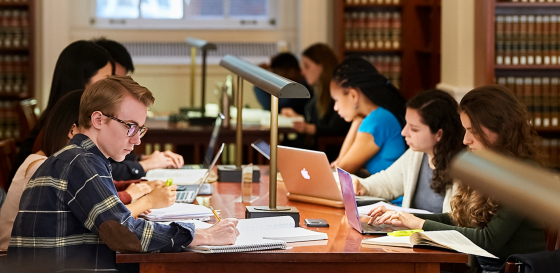 Students studying in library.