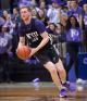 NYU Law student dribbling basketball