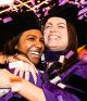 Graduates embracing at 2025 Convocation
