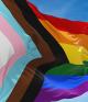 Pride flags against sky