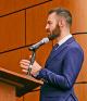 Abe Evans arguing at lectern in Marden competition