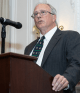 Judge Roy McLeese III ’85 speaking at a podium