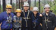 Students wearing protective headgear on alternative spring break