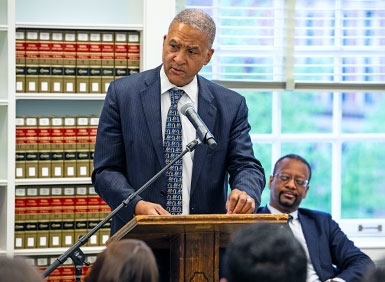 Raymond Lohier at lectern