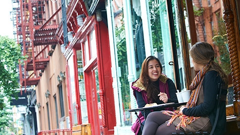 Students at an outdoor cafe in Greenwich Village