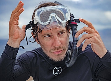 Patrick Dykstra wearing a snorkel and dive mask