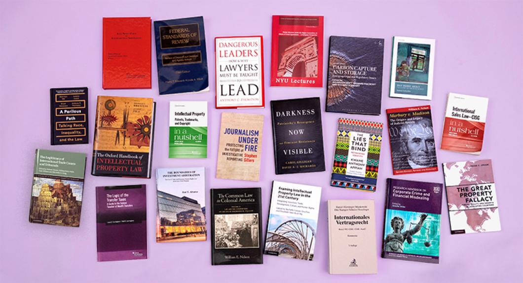photo of 22 books by NYU Law faculty members