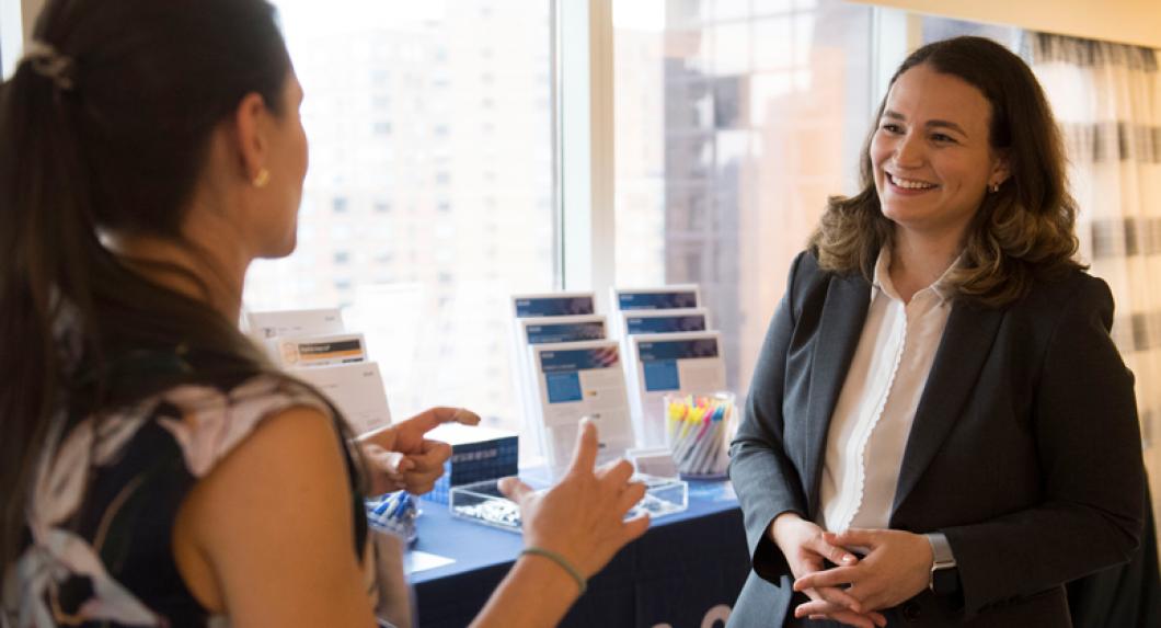 Student speaking with company representative