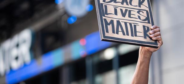 Protest sign reading "Black Lives Matter"