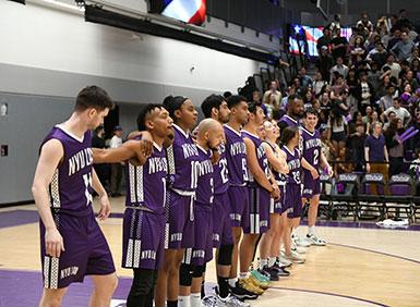 NYU Law Deans Cup Basketball Team Standing in a line