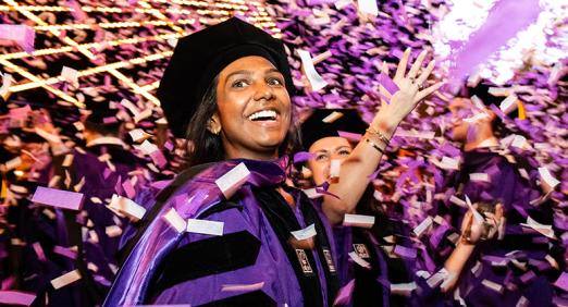 Graduates celebrate under confetti at 2025 Convocation