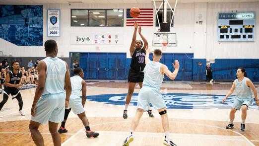 NYU Law player shooting ball in Deans' Cup game