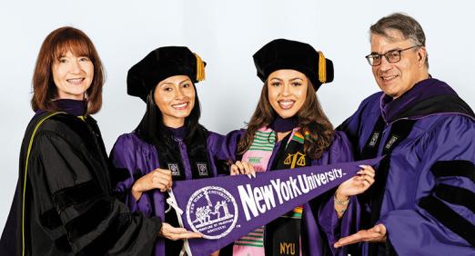 FAYE ALBERT ABSHER SCHOLARS Isabel Amaro and Kayla Hug were hooded by Cecilia Absher and NYU Law Trustee David Katz ’88