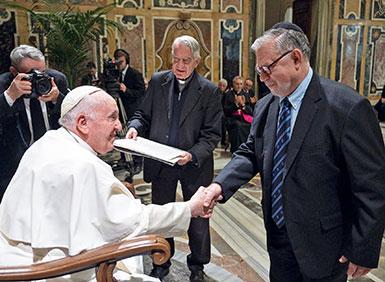 Joseph Weiler shaking hands with Pope Francis at Vatican ceremony
