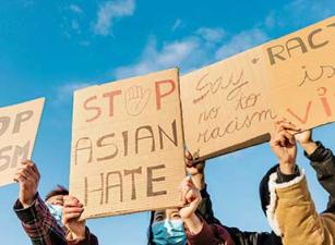 Protest sign with "Stop Asian Hate"