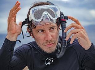 Patrick Dykstra wearing a snorkel and dive mask
