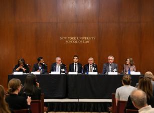 Navjeet Bal representing the 2019 Grunin Prize-winning team, Social Finance, Inc. - Veterans CARE Project, standing with Prize finalists