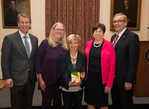 Pamela Rothenberg, Partner, Womble Bond Dickinson, winner of the 2018 Grunin Prize for Sustained Commitment standing with members of the Grunin board