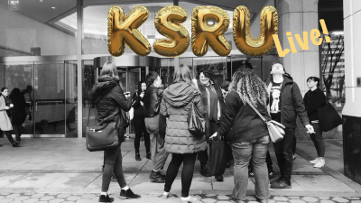 Members of the Kickstarter Union celebrating under balloons that spell out "KSRU"