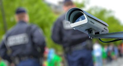 Surveillance camera and policemen