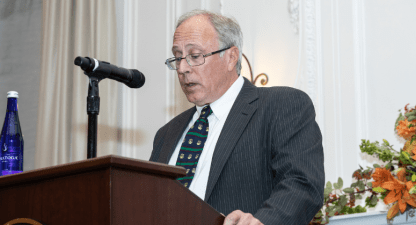 Judge Roy McLeese III ’85 speaking at a podium