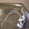 A close-up photo of a drinking fountain.