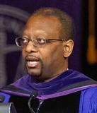 Dean Troy McKenzie in academic robes