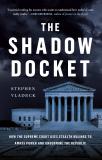 Book cover with white text that reads The Shadow Docket and a blue colored supreme court building agianst a black background