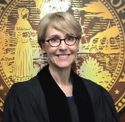 Judge Bailey smiling